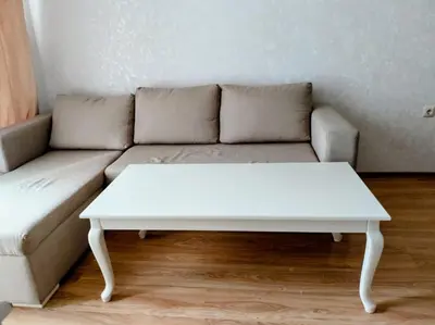 a white couch with a white coffee table in a living room at Izida Palace Garden SPA Oasis in Bŭnzareto