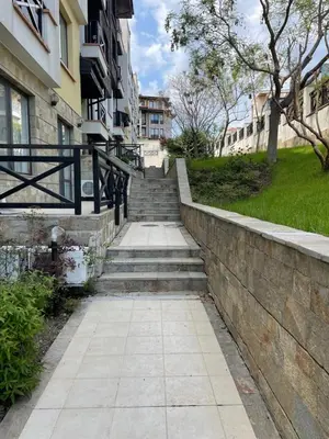 a set of stairs leading up to a building at Flat on the beach in Chernomorets