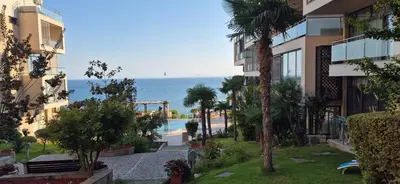 a view of the ocean from a building at East Beach Marina View Apartment in Sveti Vlas