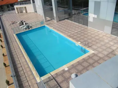 an overhead view of a large blue swimming pool at Breathtaking sea view in Byala