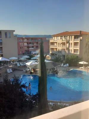 a view of a swimming pool in a city at Слънчев бряг Sunny day 6 One bedroom apartment in Sunny Beach