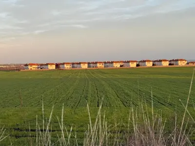 a train in a field with a green field at Villa LUNA in Kableshkovo