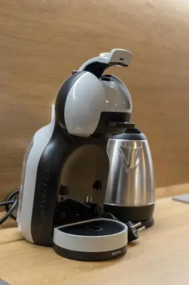 a coffee maker sitting on top of a table at Central 2BR - Workspace with Elevator in Varna City