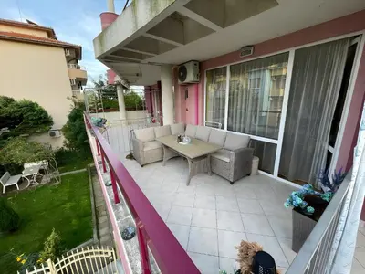 a patio with a table and chairs on a balcony at Elegant Studio near Beach - Terrace & Parking in Nesebar