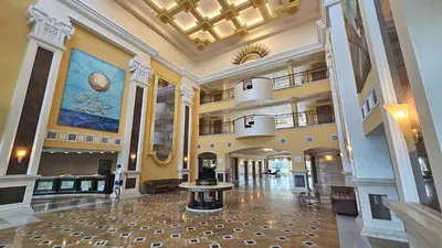 a large lobby with a table in the middle of it at Sunset C8-10 Pomorie in Pomorie