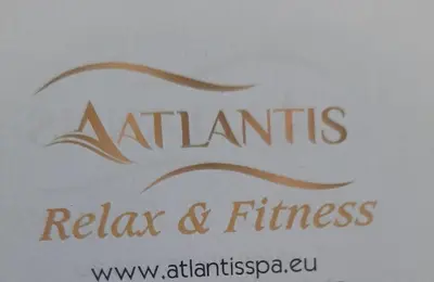 a sign for a restaurant with a logo on it at Atlantis 8016 in Burgas City
