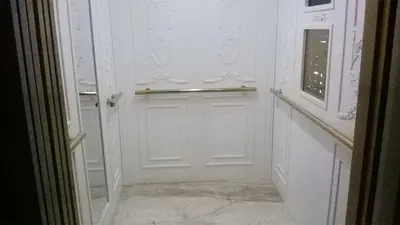 a white door with a window in a room at Villa Roma Monna in Nesebar