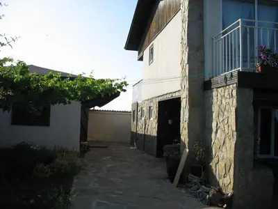 an alleyway next to a building with a balcony at Villa Magnet in Lozenets