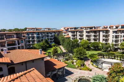 an aerial view of a city with apartment buildings at Oasis Beach Club in Lozenets
