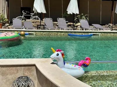 a pool with a toy unicorn in a swimming pool at Melia Mar in Sozopol