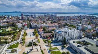 an aerial view of a city with buildings and water at Super Central Luxury Apartments in Burgas City