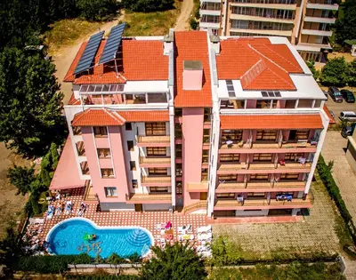 an aerial view of a building with a swimming pool at Step Hotel in Sunny Beach
