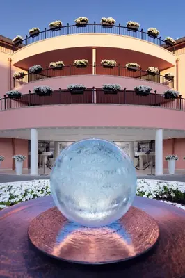 a large glass ball on a table in front of a building at Hotel Residence Dune - Free Beach Access in Sunny Beach