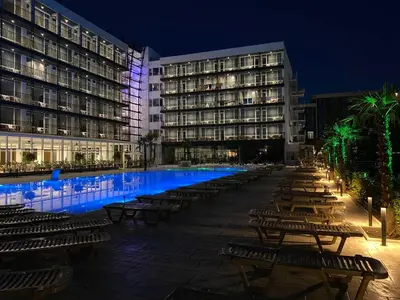 a large swimming pool in front of a building at Hotel Bavaro in Sunny Beach