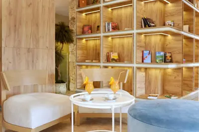 a living room with a table and two chairs at Hotel Nobel Ultra All Inclusive - FREE Beach Access in Sunny Beach