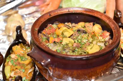 a pot of food sitting on top of a table at Villas Ropotamo in Primorsko