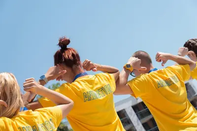 a group of girls soccer team in yellow shirts at Hotel Pomorie Sun - All Inclusive in Sunny Beach
