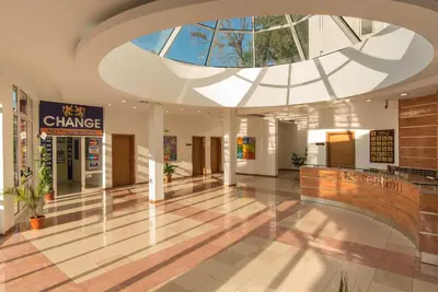 a lobby of a building with a skylight at Hotel Fenix - All Inclusive in Sunny Beach