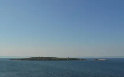 an island in the middle of a large body of water at Hotel Diamanti in Sozopol