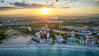 an aerial view of a city with the words paid apartments at Perla Apartments in Nesebar