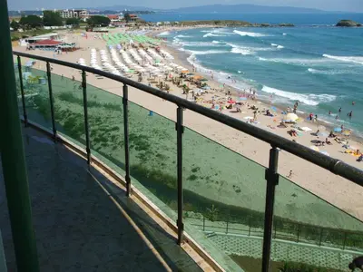 a view of a beach with people and the ocean at Samara Apartment in Lozenets