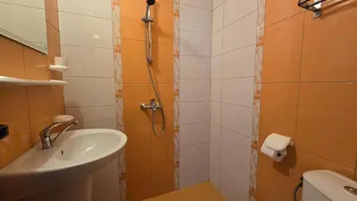 a bathroom with a shower and a sink at Estreya in Tsarevo