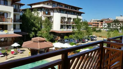 a view from the balcony of a hotel with a beach at Apartments Resort BG in Primorsko