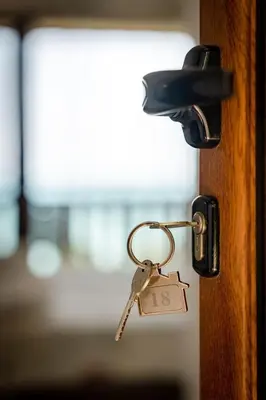a lock on a door with a key at Complex Fichoza in Varna City