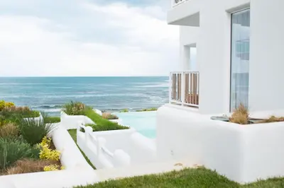 a white house with a view of the ocean at Sea Sense Boutique Villa & Relax Zone in Sozopol