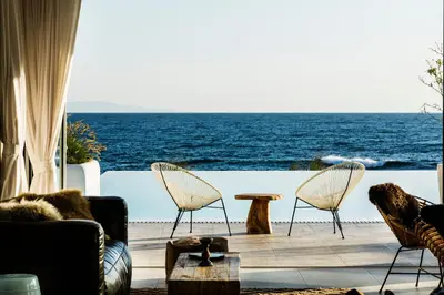 a living room with a view of the ocean at Sea Sense Boutique Villa & Relax Zone in Sozopol