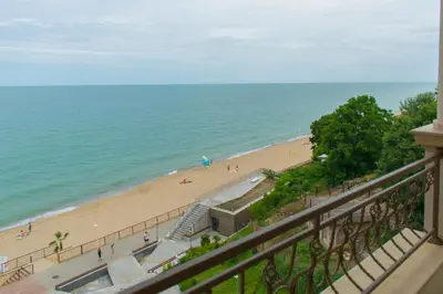 a view of a beach from a balcony at Paraiso Theopolis - All Inclusive in Obzor