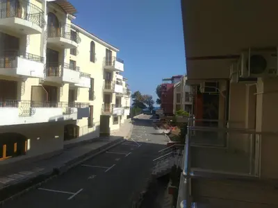 a view of an empty street between two buildings at Sea'n'Pool Apartments in Hotel in Sozopol