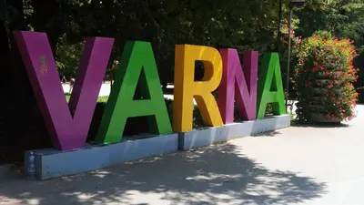 a large sign that says vrra on a sidewalk at Comfort Zamenhof in Varna City