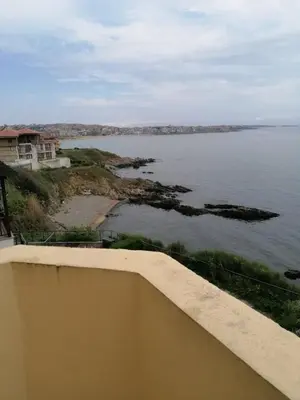 a view of a body of water from a balcony at Villa Krisia Apartments in Sozopol