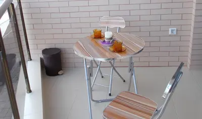 a small table with two cups on top of it at Apartment Bliznaci in Pomorie