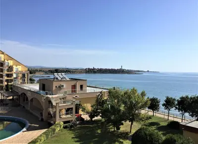 a view of the ocean from a building at Apartament Aheloy in Aheloy