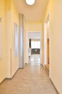 an empty hallway with a tile floor at Central studio 1 in Burgas City