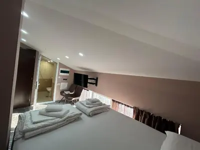 a room with two beds in a room at Guest House SG-BROTHERS in Obzor