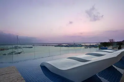 a large white boat sitting on top of a swimming pool at Blu Bay Hotel Sozopol in Sozopol