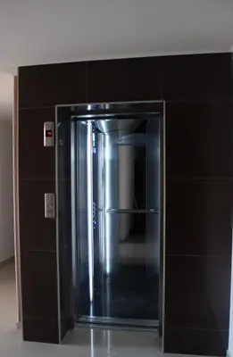 a large stainless steel refrigerator in a room at Studio Martin in Pomorie