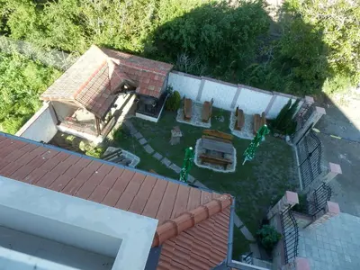 an aerial view of a house with a yard at Aleksandrovo Apartments in Aleksandrovo