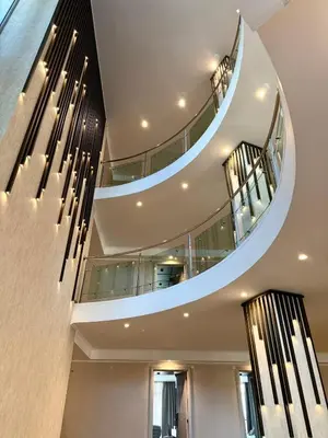 an image of a spiral staircase in a building at Hotel Luxor in Burgas City