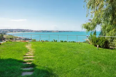 a path in the grass with a view of the water at Apartment Sea Shell 1 in Sozopol