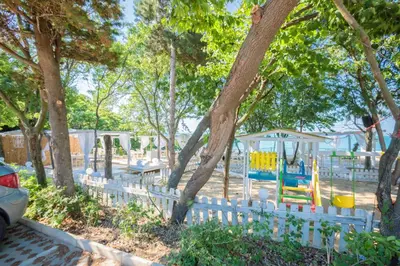 a park with a playground with a swing set at Apartment Sea Shell 1 in Sozopol