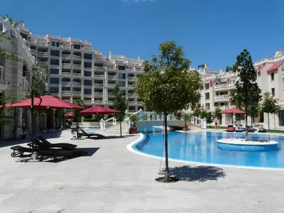 a large apartment complex with a large swimming pool at Апартаменти Варна Саут на плажа - Varna South Apartments on the beach in Varna City