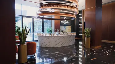 a lobby of a hotel with a reception desk at Hotel Cherno More in Varna City