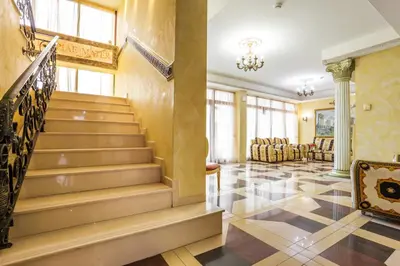 a staircase in a building with a lobby at Family Hotel Gold Pearl in Sunny Beach