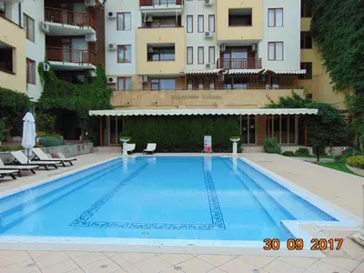 a large swimming pool in front of a building at Болгария, г.Свети Влас, к.