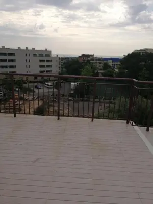 a balcony with a view of a city at Hotel Sapphire in Primorsko