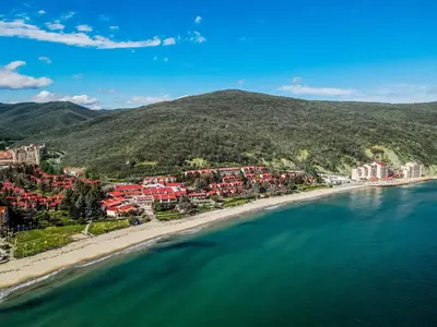 an aerial view of a beach with houses and the ocean at Villas Elenite in Elenite